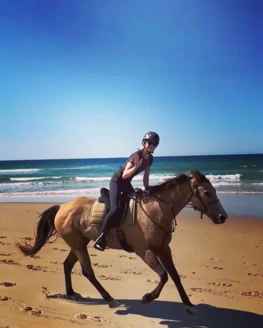 Horse riding on beach